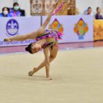 The young gymnast performs in Thailand.