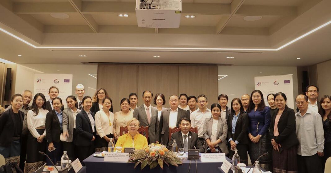 Deputy Minister of Industry and Commerce, Manothong Vongxay, Ambassador of the European Union to Laos, Ina Marčiulionytė, and participants at the ARISE Plus 6th Project Review Committee.