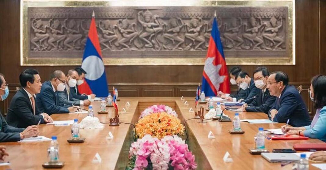 Foreign minister Prak Sokhonn (second right) and his Lao counterpart Saleumxay Kommasith (second left) at a meeting in February (Cambodia Ministry of Foreign Affairs and Internal Cooperation)