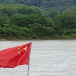 Chinese Flag on Barge along Mekong River