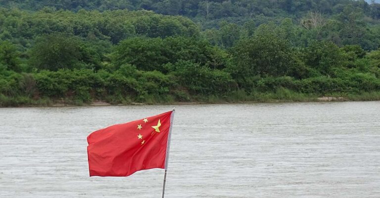 Chinese Flag on Barge along Mekong River