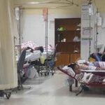 Dengue patients sleep in makeshift beds at Vientiane’s Mahosot hospital during an outbreak in 2019.