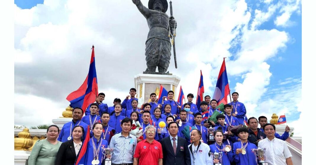 Laos men's and women's Sepak Takraw teams celebrate their wins