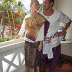 Foreign visitors make use of national dress rental service, “Sao Sinh” to visit the temples of Luang Prabang in style.