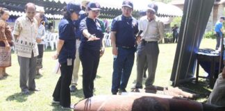 Authorities view UXO in Salavanh Province.