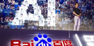 Robin Li, CEO of search giant Baidu, talks about AI during the Baidu Create 2018 held in Beijing, China, Wednesday, July 4, 2018. Baidu Inc., one of China’s biggest search and artificial intelligence firms, said Wednesday, Feb. 22, 2023, it plans to implement its artificial intelligence chatbot Ernie into its search services from March. (AP Photo/Ng Han Guan)