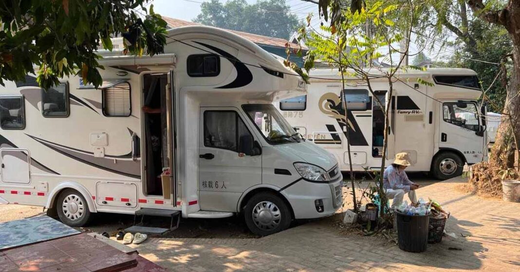 Motorhomes parked along the river in downtown Luang Prabang.