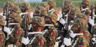 Myanmar military units parade during Armed Forces Day.