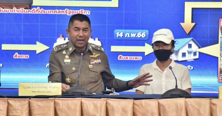 Deputy National Police Chief Surachet Hakpal, left, talks to reporters with Tubtim "Sue" Howson, 57, during press conference at police headquarter in Bangkok, Thailand, Wednesday, Feb. 15, 2023.