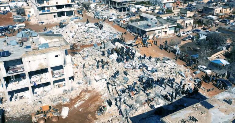 Damaged buildings and rescue operations are seen in the aftermath of the earthquake, in Aleppo, Syria February 7, 2023, in this screen grab taken from a social media video. White Helmets/Handout via REUTERS