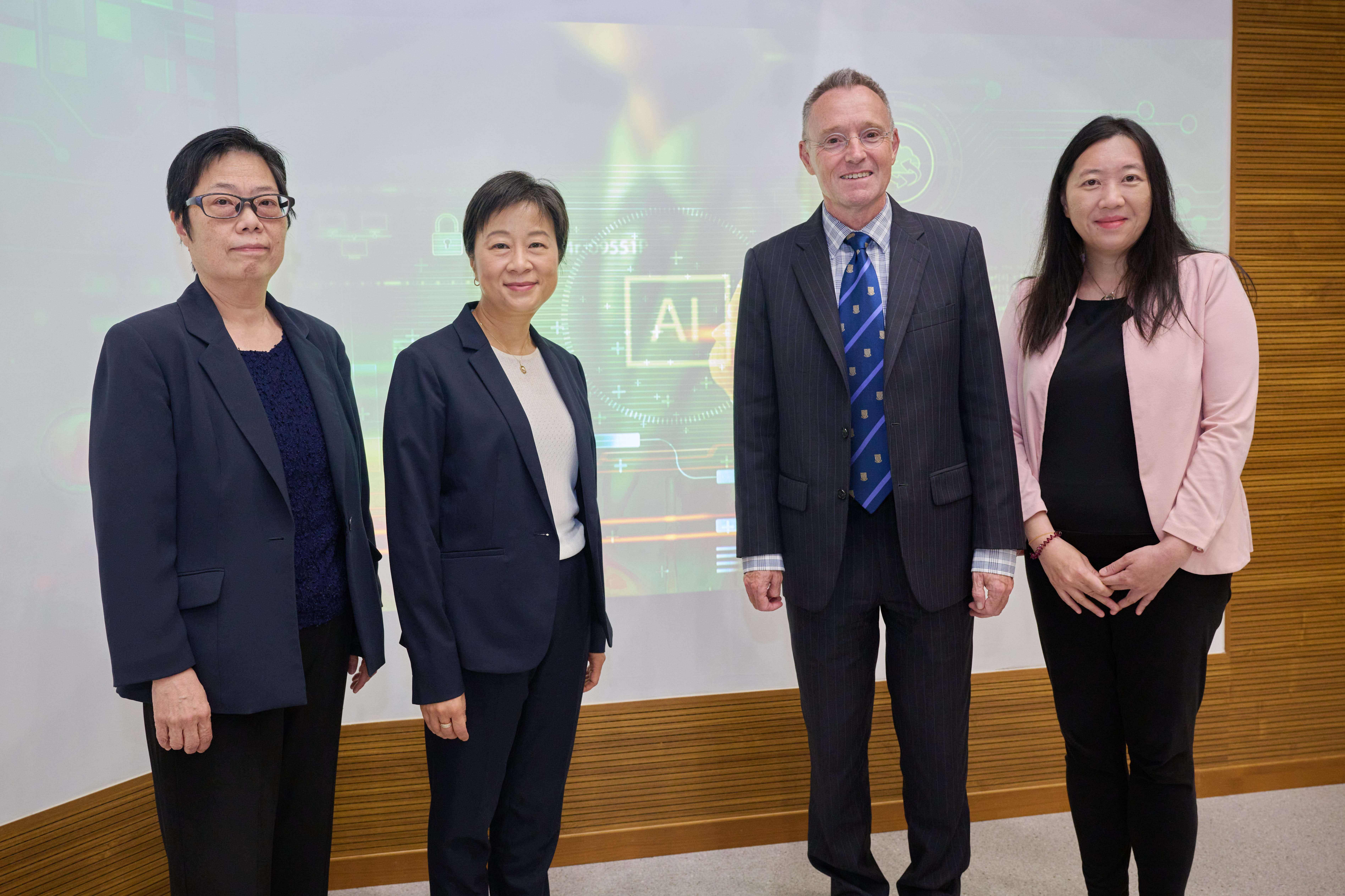(From left) Ms Flora Ng, Professor Pauline Chiu, Professor Ian Holliday and Professor Cecilia Chan