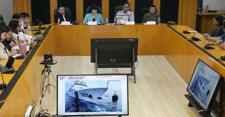 ﻿ Philippine Coast Guard spokesperson, Commodore Jay Tarriela, second from left, shows reporters a video of an incident involving a Chinese coast guard ship with bow number 5203 and a Philippine military-run supply boat during a press conference In Quezon City, Philippines on Monday, Oct. 23, 2023. A Chinese coast guard ship and an accompanying vessel rammed a Philippine coast guard ship and a military-run supply boat Sunday off a contested shoal, Philippine officials said, in an encounter that heightened fears of an armed conflict in the disputed South China Sea. (AP Photo/Aaron Favila)