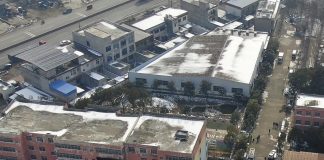 In this photo released by Xinhua News Agency, an aerial drone shows the dormitory with charred windows after a fire at the Yingcai School in Dushu Town, Fangcheng County, Nanyang city in central China's Henan province on Jan. 20, 2024. A fire broke out in dorms at the boarding school for elementary students in central Henan province, and more than a dozen students died in the blaze, Chinese state media reported Saturday. (Wu Gang/Xinhua via AP)