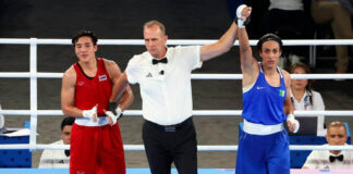 Algerian Boxer Advances to Gold-Medal Round at Paris Olympics Amid Gender Controversy