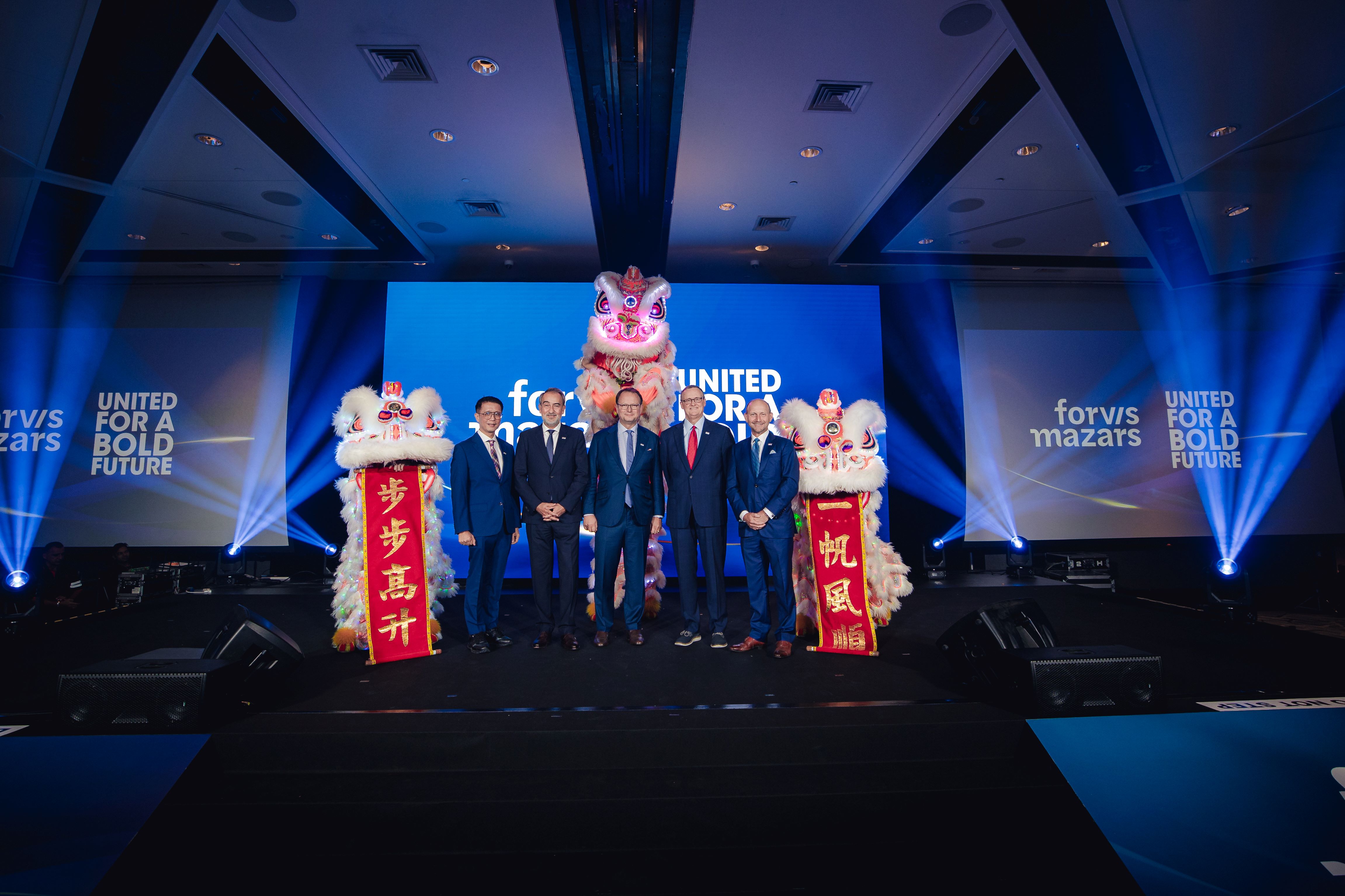 Celebrating the launch of our new brand in APAC with our global leaders! (From left to right) Rick Chan, Managing Partner, Forvis Mazars in Singapore and Head of Audit & Assurance APAC; Hérve Hélias, Chair, Forvis Mazars Global Network Executive Board; Pascal Jauffret, Head of Forvis Mazars in APAC and member of the Forvis Mazars Group Executive Board; Matt Snow, Vice-Chair, Forvis Mazars Global Network Executive Board; and Tom Watson, Chief Executive Officer, Forvis Mazars in the United States.