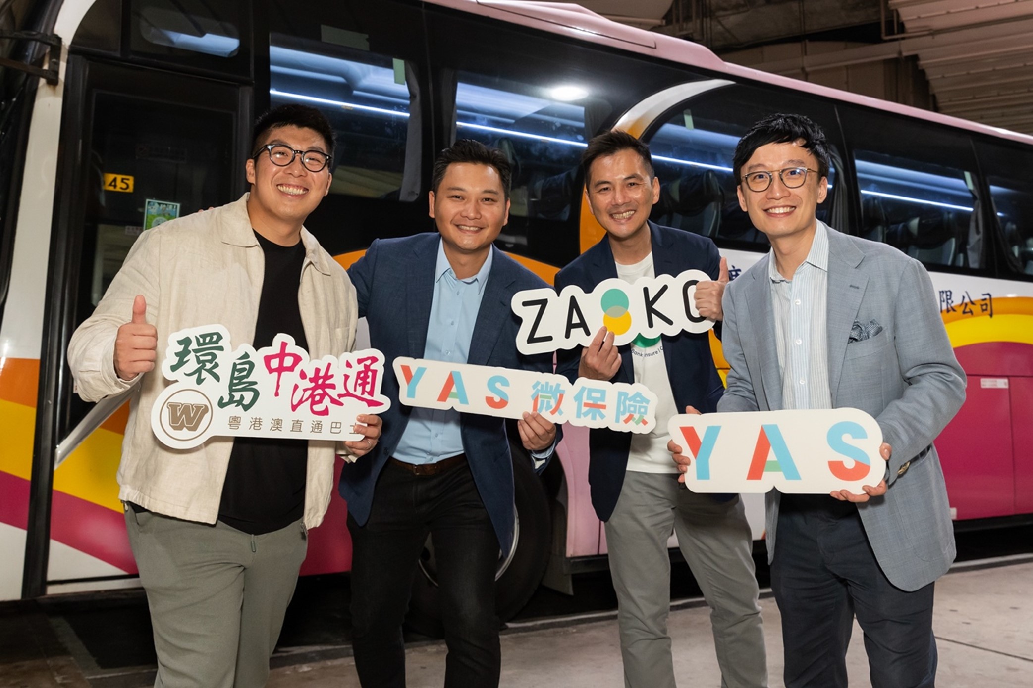 Kwoon Chung Bus has partnered with YAS, an InsurTech pioneer, to launch Hong Kong's first embedded travel insurance specifically designed for cross-border bus trips. (From right) Mr. William Lee, Co-founder of YAS, Mr. Adrian Leung, Director of ZAKC Limited, Mr. Andy Ann, Co-founder of YAS, and Mr. Timothy Wong, COO of Kwoon Chung Group