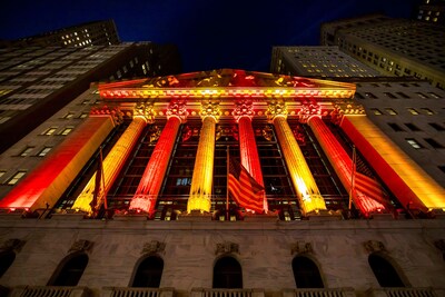 NYSE façade with its iconic six columned façade, lit with red and yellow to signify wisdom, success, and fortune for the lunar new year celebration, photo taken on Jan 28th 2025