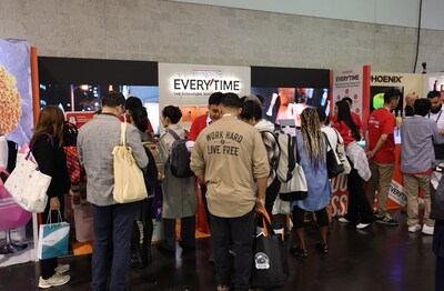 Crowds gather at the JungKwanJang booth to explore and experience red ginseng products.
