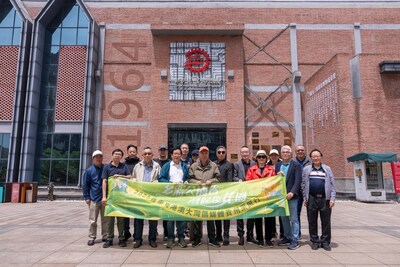 Journalists on the media tour gather for a group photo outside the Duyun Third Front Movement Museum.
