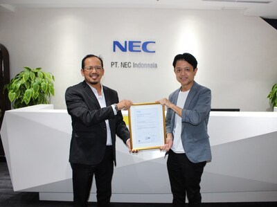 Joji Yamamoto, President Director of NEC Indonesia, receives the ISO/IEC 27001:2022 certificate from Achmad Zakky Ridwan, Country Chair of Det Norske Veritas (DNV) Indonesia on behalf of DNV. This certification reinforces NEC Indonesia’s commitment to delivering secure, reliable, and regulation-compliant IT services.