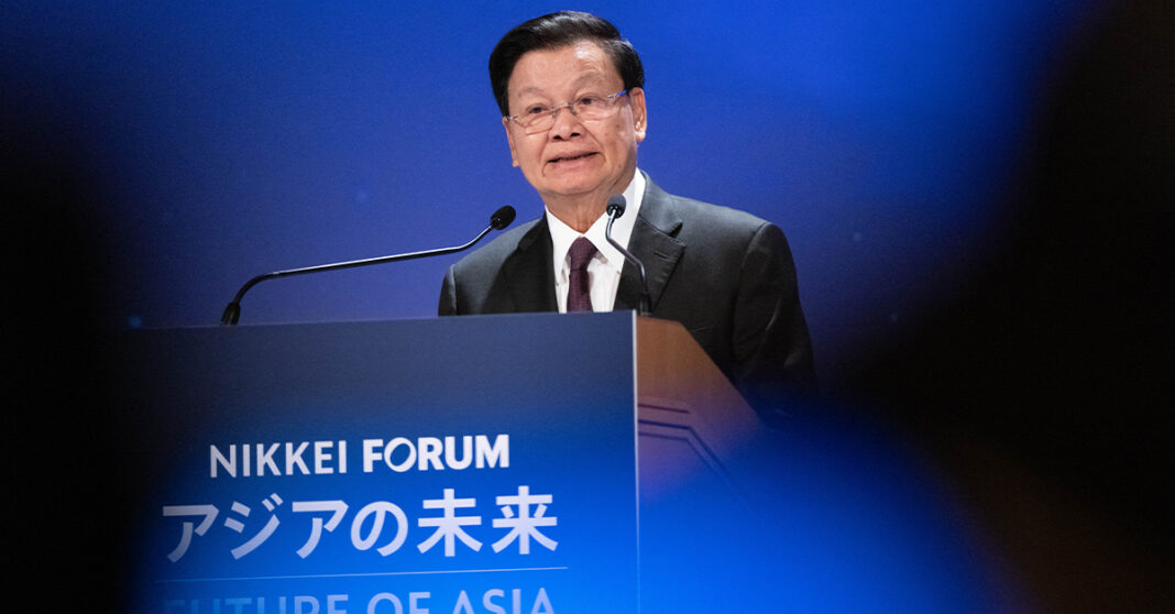 Laos' President Thongloun Sisoulith delivers a speech during the Nikkei Forum 
