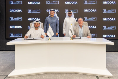H.E. Jassem Mohamed Bu Ataba Al Zaabi, Chairman of Gridora; H.E. Mohamed Ali Al Shorafa,Chairman of the Department of Municipalities and Transport; H.E. Eng. Maysarah Mahmoud Eid, Director General of ADPIC; and Bill O’Regan, Group CEO of Modon Holding, at the Gridora x ADPIC MoU signing. H.E. Jassem Mohamed Bu Ataba Al Zaabi, Chairman of Gridora; H.E. Mohamed Ali Al Shorafa,Chairman of the Department of Municipalities and Transport; H.E. Eng. Maysarah Mahmoud Eid, Director General of ADPIC; and Bill O’Regan, Group CEO of Modon Holding, at the Gridora x ADPIC MoU signing.