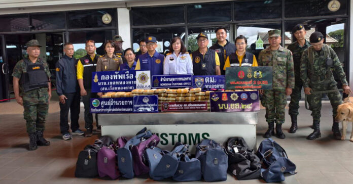 Thai police seized nearly 1 million meth pills from a Lao truck; similar smuggling via boat and cars also reported