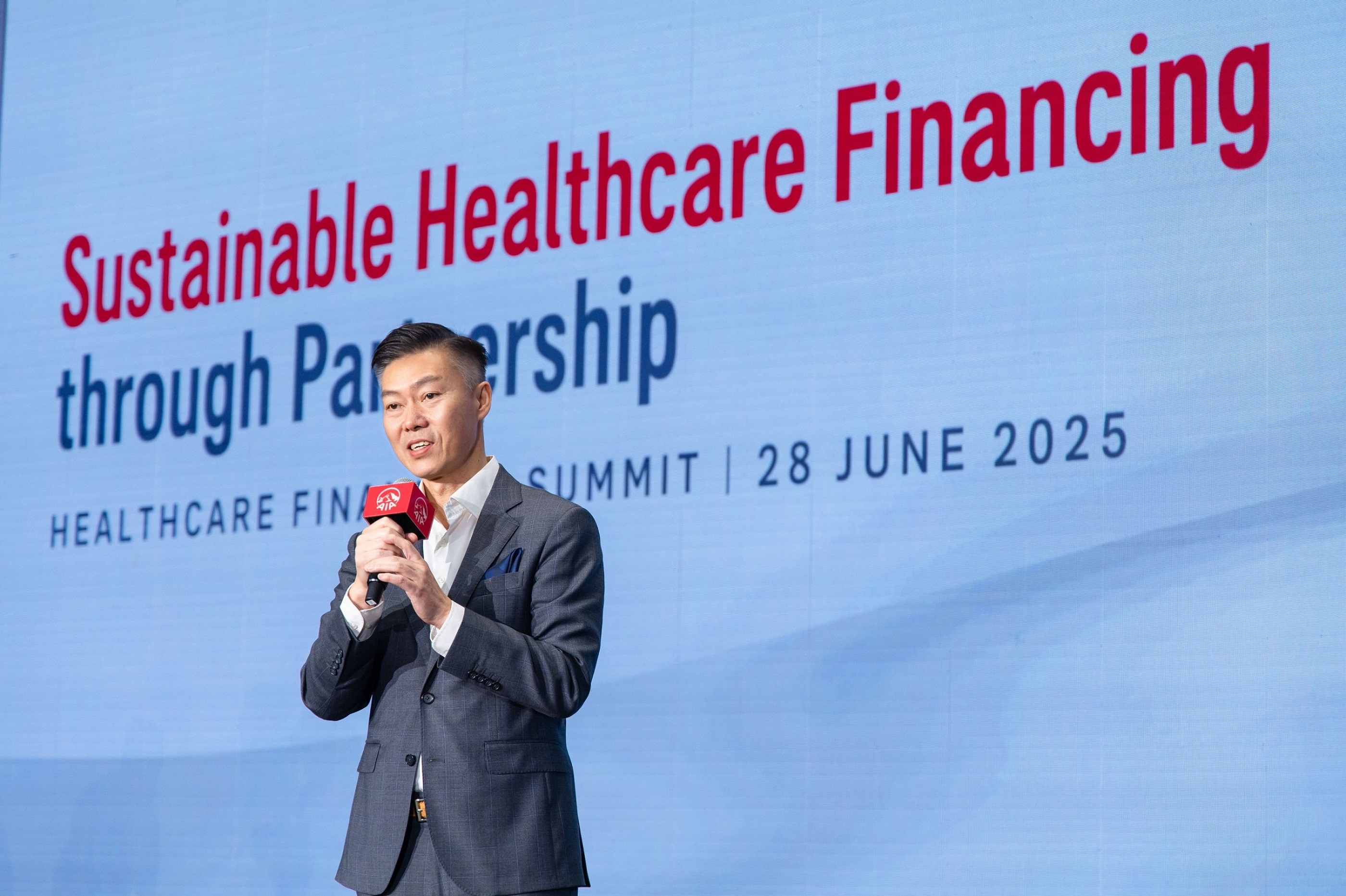 Caption: Alger Fung, Chief Executive Officer of AIA Hong Kong & Macau, delivers the opening address, highlighting the importance of collaboration across sectors to build a more inclusive and sustainable healthcare system for the community and future generations.
