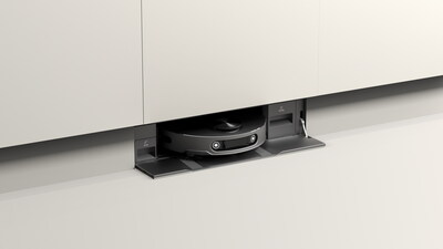 LG’s built-in robot vacuum station fits seamlessly under a kitchen sink, offering a hidden and hands-free cleaning solution.