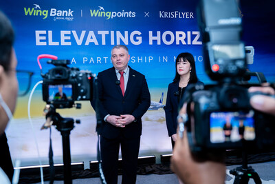 Ms. Berlinda Yong, General Manager of Singapore Airlines in Cambodia, and Dr. Dmytro Kolechko speak to members of the press during the partnership launch event.
