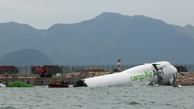 Two killed as cargo plane skids off Hong Kong runway