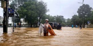 Record Vietnam Rains Kill Seven, Flood 100,000 Homes