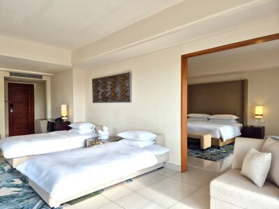 1 Bedroom Larger Family Suite, 1 King, Sofa Bed, Garden View, Garden Level, Terrace (Larger Family Suite) at Sheraton Bali Kuta Resort 1 Bedroom Larger Family Suite, 1 King, Sofa Bed, Garden View, Garden Level, Terrace (Larger Family Suite) at Sheraton Bali Kuta Resort