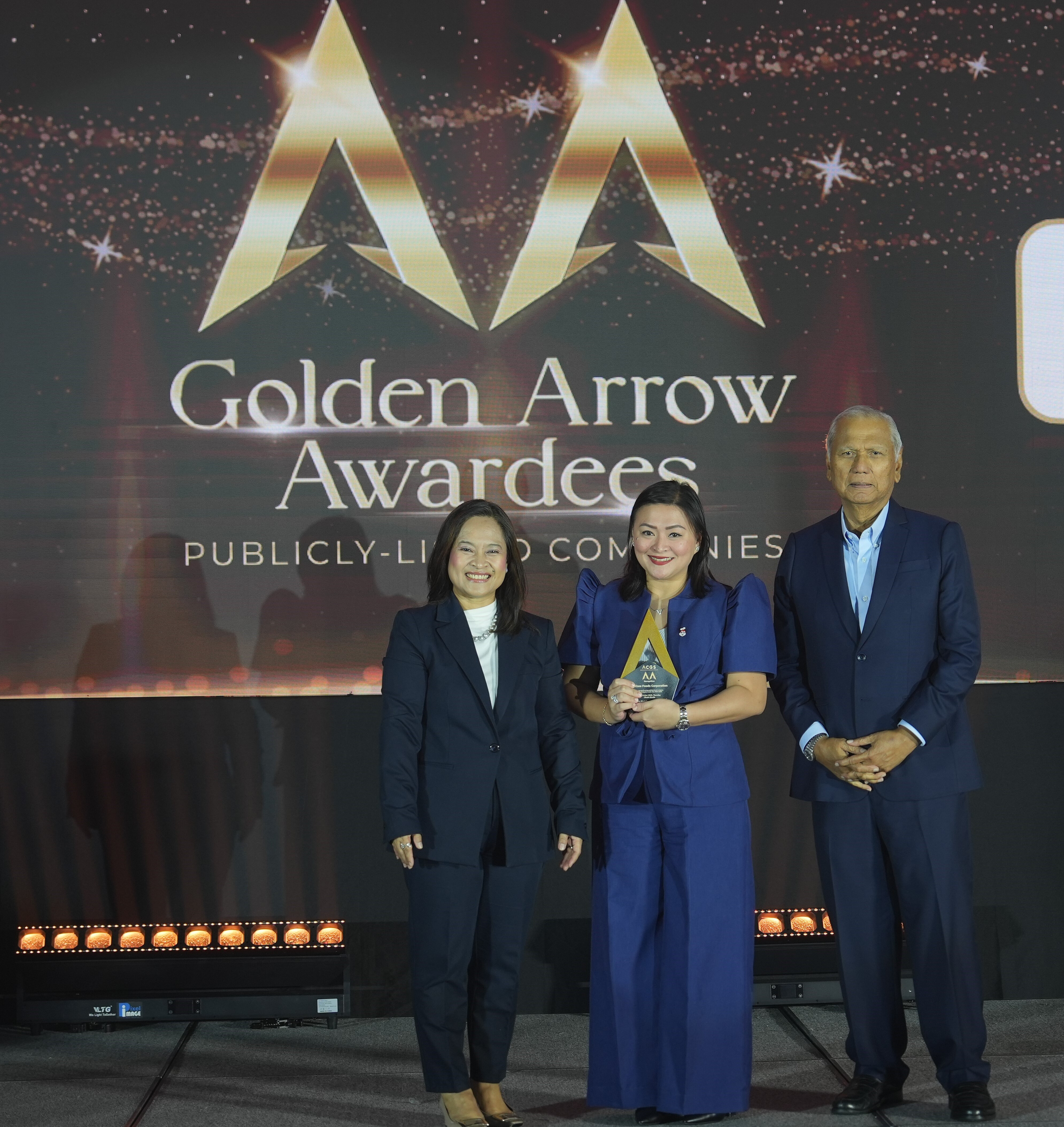 A Milestone for Good Governance. The Jollibee Foods Corporation's corporate governance efforts have been recognized anew at the Golden Arrow Awards 2025, presented by the Institute of Corporate Directors. Receiving the award on behalf of the Group is Atty. Vem King (middle), General Counsel, Corporate & Commercial Global, of the Jollibee Group.