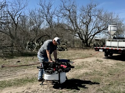 Curtis Schramm prepares his XAG P150 agricultural drone for a brush-control job. (Photo: Brandon Thomas)