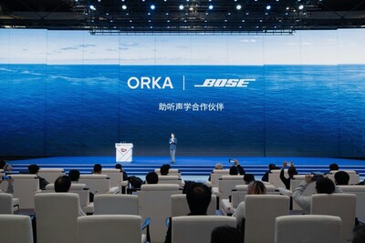 Orka CEO announces the Orka × Bose partnership at the AWE 2026 main stage, Shanghai, March 12, 2026.