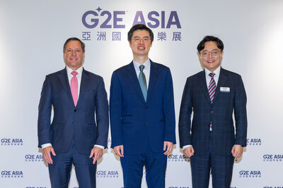 Following his keynote address at G2E Asia 2026, Chum (centre) gathers with Bill Miller (left), president and CEO of the American Gaming Association, and J.B. Son (right), senior vice president of Reed Exhibitions, Asia Pacific.