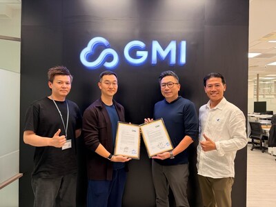 Four individuals pose in front of a GMI logo, holding signed documents as part of a collaboration announcement between Compal and GMI Cloud Four individuals pose in front of a GMI logo, holding signed documents as part of a collaboration announcement between Compal and GMI Cloud