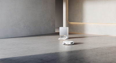 The Narwal Flow 2 White robot vacuum and mop system is shown in a minimalist modern interior, featuring a sleek white design that blends seamlessly with the contemporary space. The Narwal Flow 2 White robot vacuum and mop system is shown in a minimalist modern interior, featuring a sleek white design that blends seamlessly with the contemporary space.