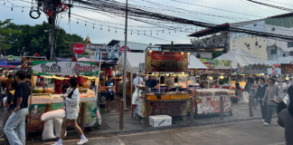 Vendors prepare to leave Sihom Night Market in Vientiane ahead of its scheduled closure