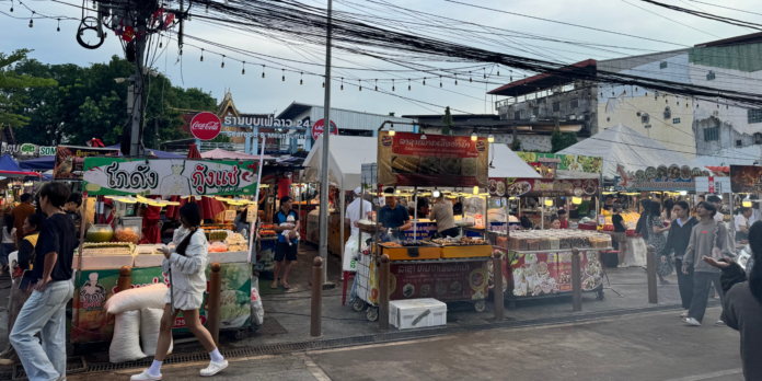 Vendors prepare to leave Sihom Night Market in Vientiane ahead of its scheduled closure