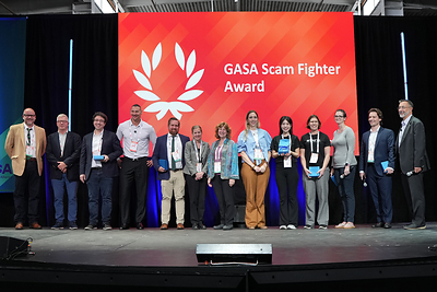 ScamAdviser Head of Growth, Yuying Shih (fifth from the right), receives the Scam Fighter Award for Watchmen at GASS America 2026 ScamAdviser Head of Growth, Yuying Shih (fifth from the right), receives the Scam Fighter Award for Watchmen at GASS America 2026