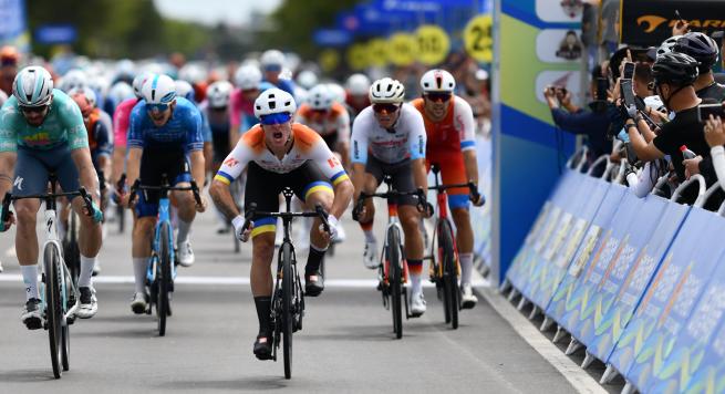 Riders battle for position and make their moves on the course.